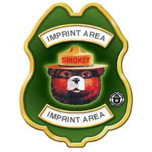 Imprinted Smokey Bear Green and Yellow Plastic Decal Badge firefighting, fire safety product, fire prevention, smokey, smokey bear, clip-on badge, badge, bear, imprinted, department name,  Smokey Bear badge, wildfire prevention giveaway, Only You badge, green and yellow Smokey Bear sticker, kids fire safety badge, fire department promotional items, EMS community outreach, police event giveaways, plastic decal badge for children, public education materials